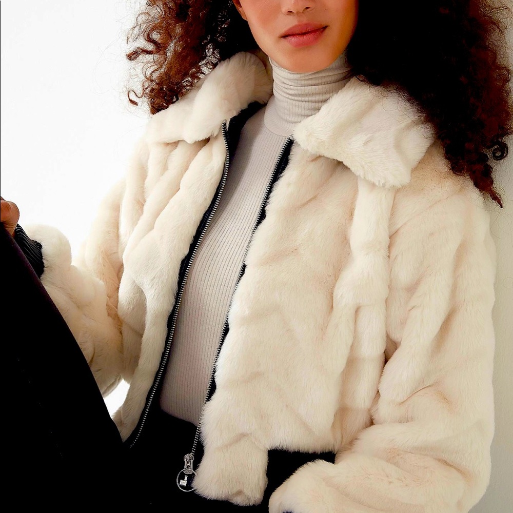 New with tags, showstopper urban outfitters white faux fur cropped bomber